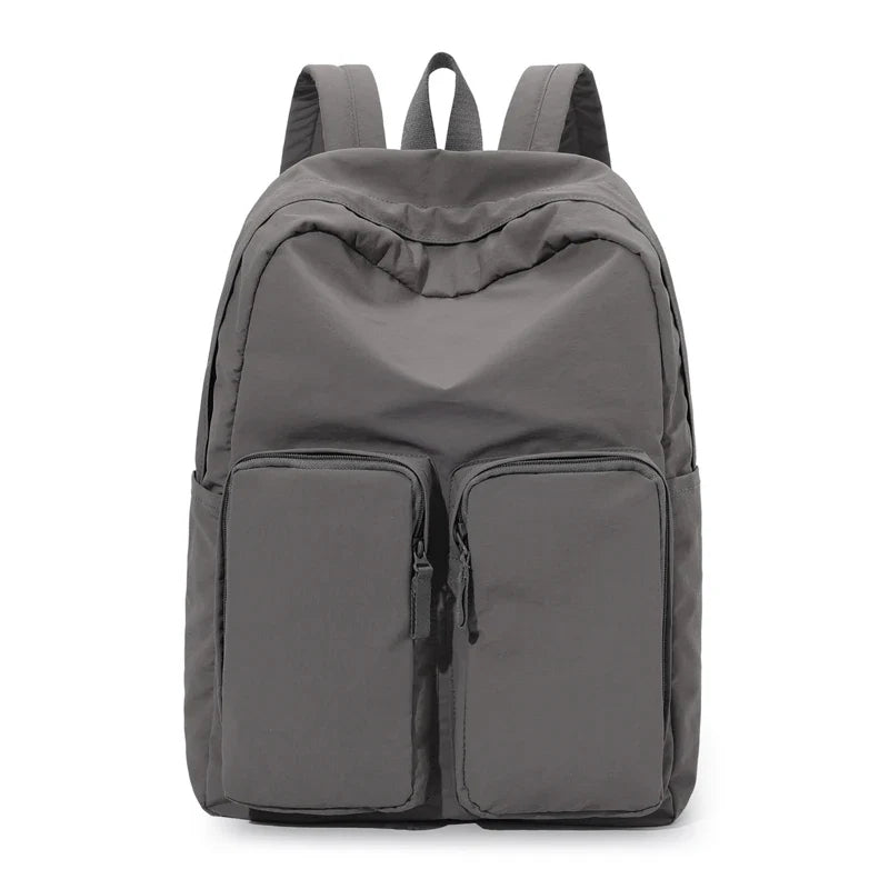 Water - resistant double - shoulder backpack. It has a large capacity, is lightweight and casual. Made of wrinkled and washed ny