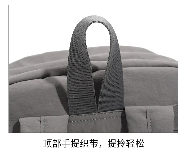 Water - resistant double - shoulder backpack. It has a large capacity, is lightweight and casual. Made of wrinkled and washed ny