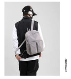 Water - resistant double - shoulder backpack. It has a large capacity, is lightweight and casual. Made of wrinkled and washed ny