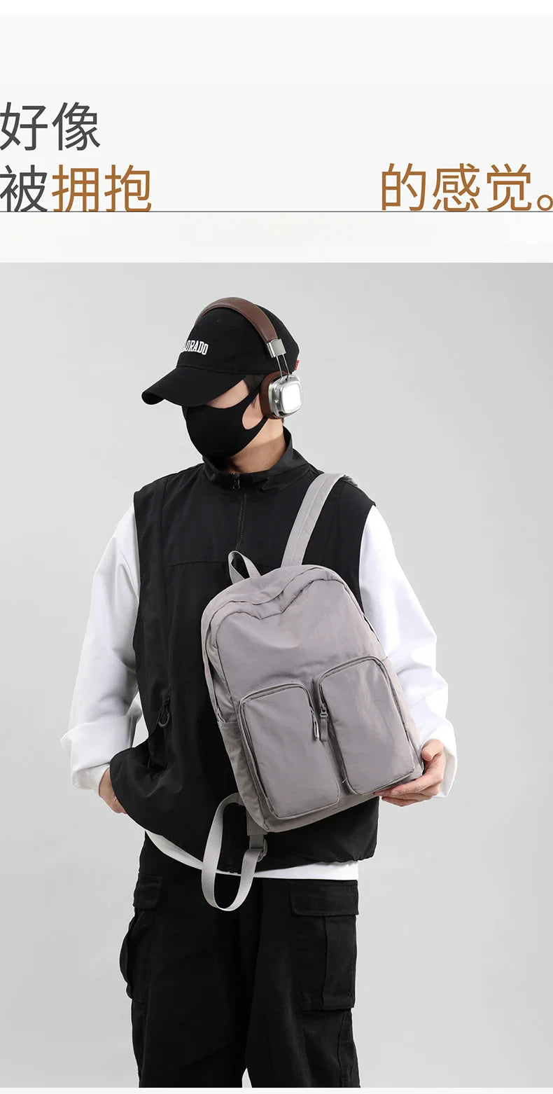 Water - resistant double - shoulder backpack. It has a large capacity, is lightweight and casual. Made of wrinkled and washed ny